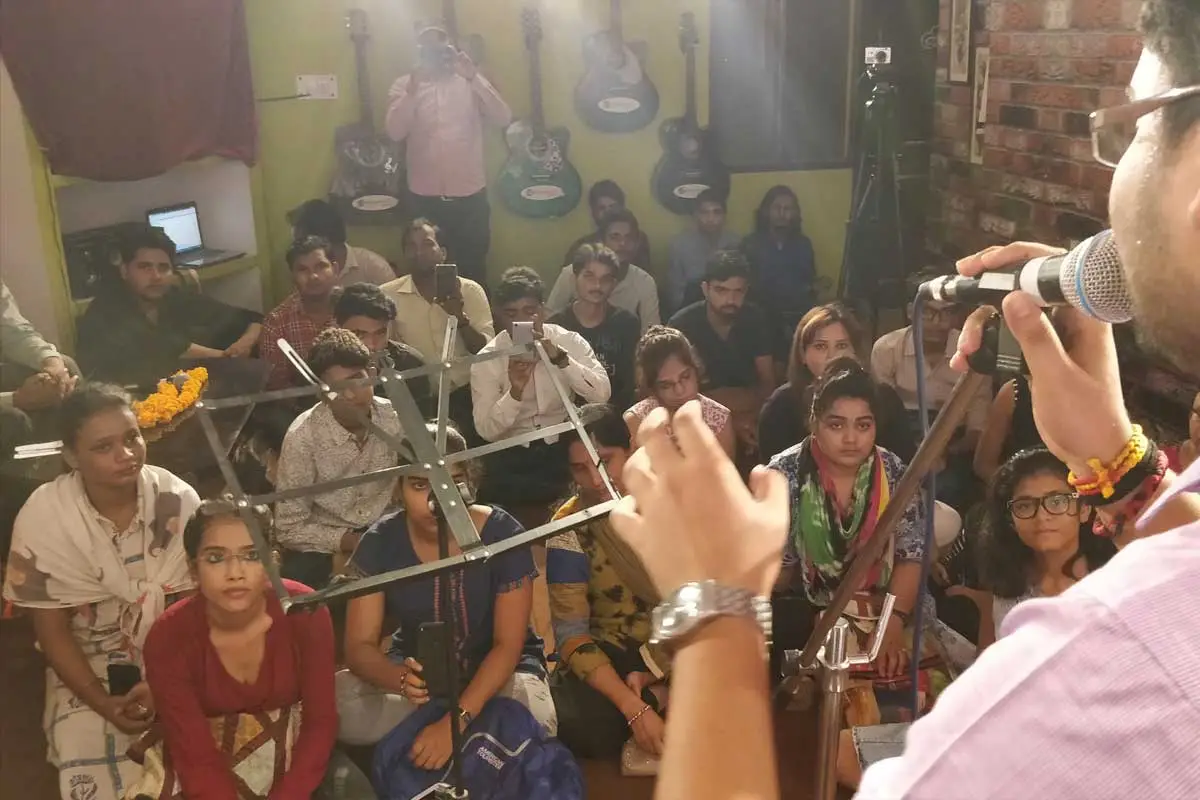 Stage singing performance at Aalaap Music Academy event
