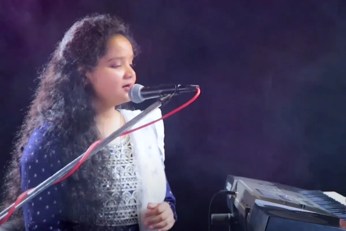 Student singing performance by Aalaap student